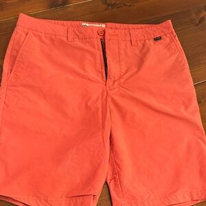 Travis Mathew Bright Coral Flat Front Shorts